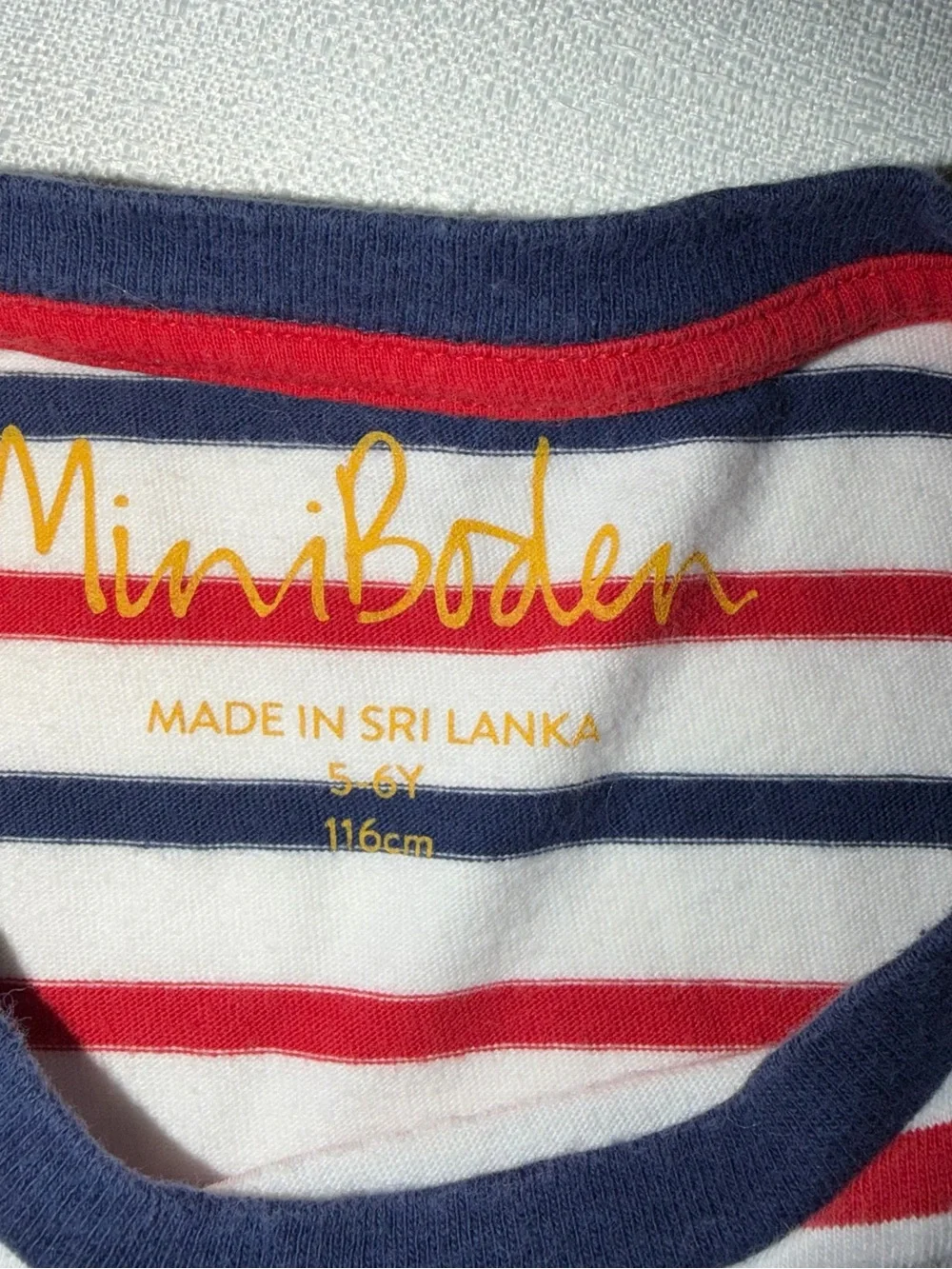 Two Mini Boden appliqué T-shirts, and two pair of shorts size 5/6